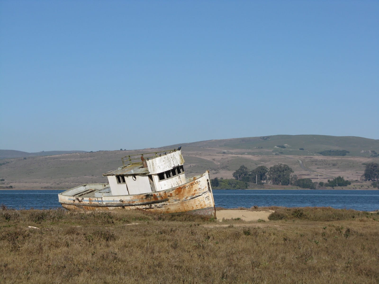 An old boat run aground somewhere in Marin County.