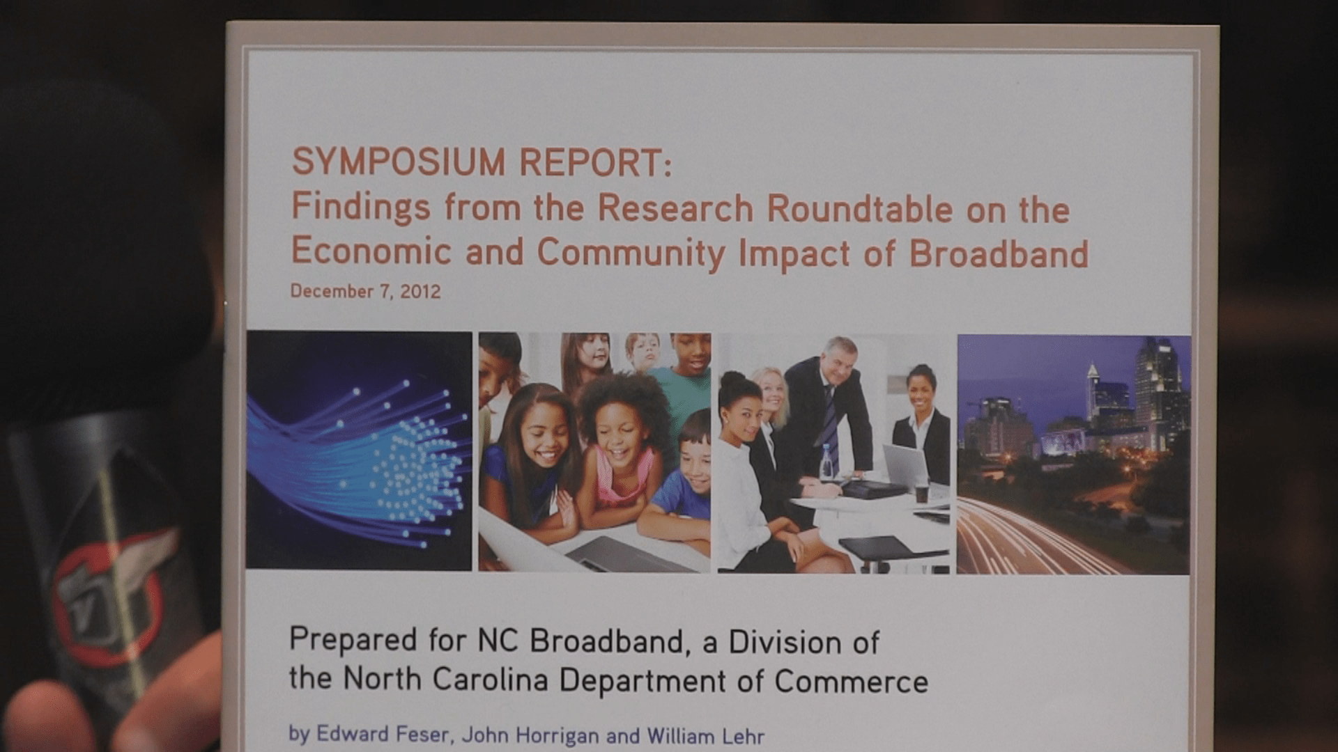The cover of the NC Broadband Symposium Report, as seen at the 2013 Broadband Communities Summit.