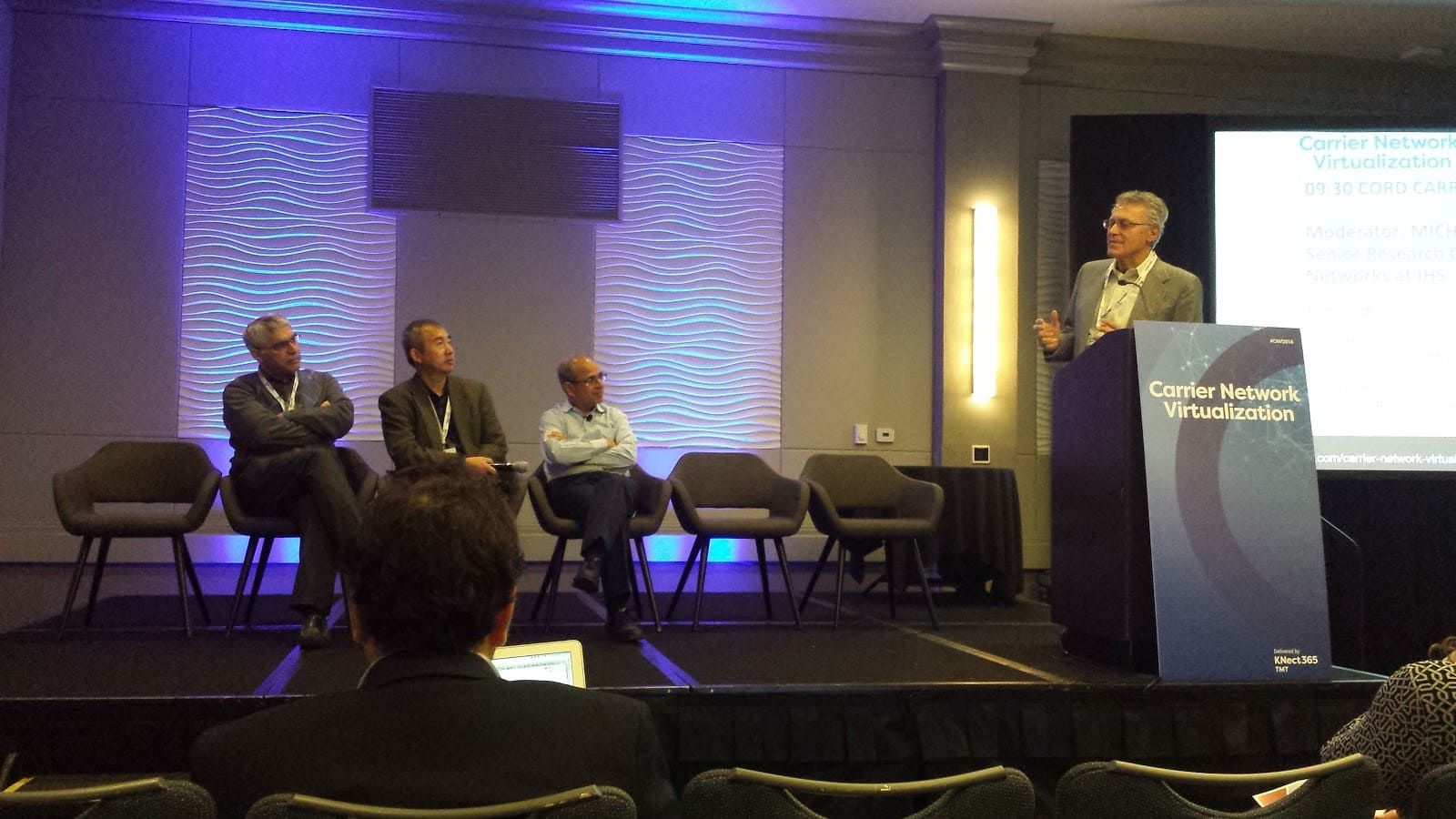 Michael Howard moderating the CORD panel at the Carrier Network Virtualization conference.